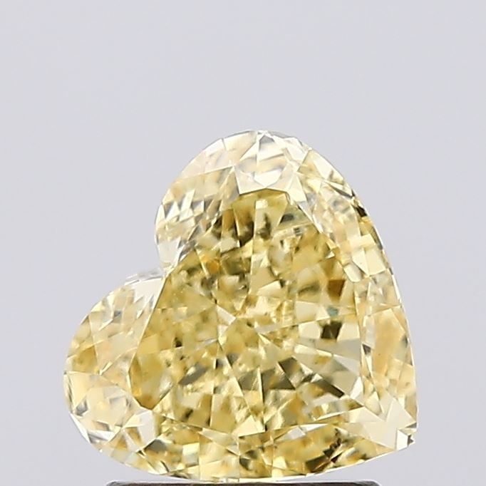 Loose Diamond - HEART 1.54ct Fancy Intense Yellow VS1: Loose Diamond - HEART 1.54ct Fancy Intense Yellow VS1 Source: This is a real non-mined Diamond that has been grown in a lab Shape: HEART Carats: 1.54 Color: Fancy Intense Yellow Certification: IGI Vid