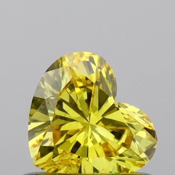Loose Diamond - HEART 0.48ct Fancy Vivid Yellow SI1: Loose Diamond - HEART 0.48ct Fancy Vivid Yellow SI1 Source: This is a real non-mined Diamond that has been grown in a lab Shape: HEART Carats: 0.48 Color: Fancy Vivid Yellow Certification: IGI Video: