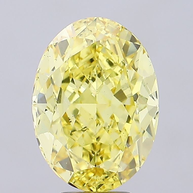 Loose Diamond - OVAL 8.34ct Fancy Vivid Yellow VS2: Loose Diamond - OVAL 8.34ct Fancy Vivid Yellow VS2 Source: This is a real non-mined Diamond that has been grown in a lab Shape: OVAL Carats: 8.34 Color: Fancy Vivid Yellow Certification: IGI Video: