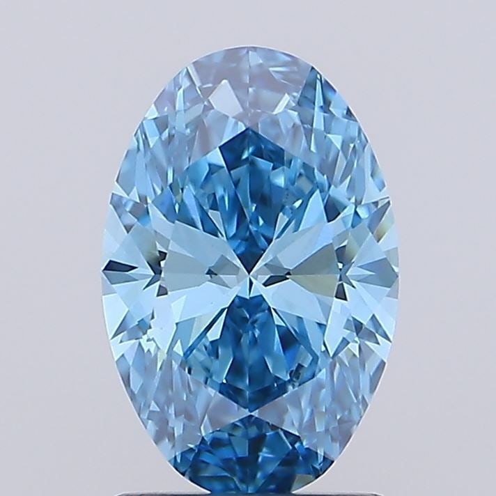 Loose Diamond - OVAL 1.51ct Fancy Vivid Blue VVS2: Loose Diamond - OVAL 1.51ct Fancy Vivid Blue VVS2 Source: This is a real non-mined Diamond that has been grown in a lab Shape: OVAL Carats: 1.51 Color: Fancy Vivid Blue Certification: IGI Video: