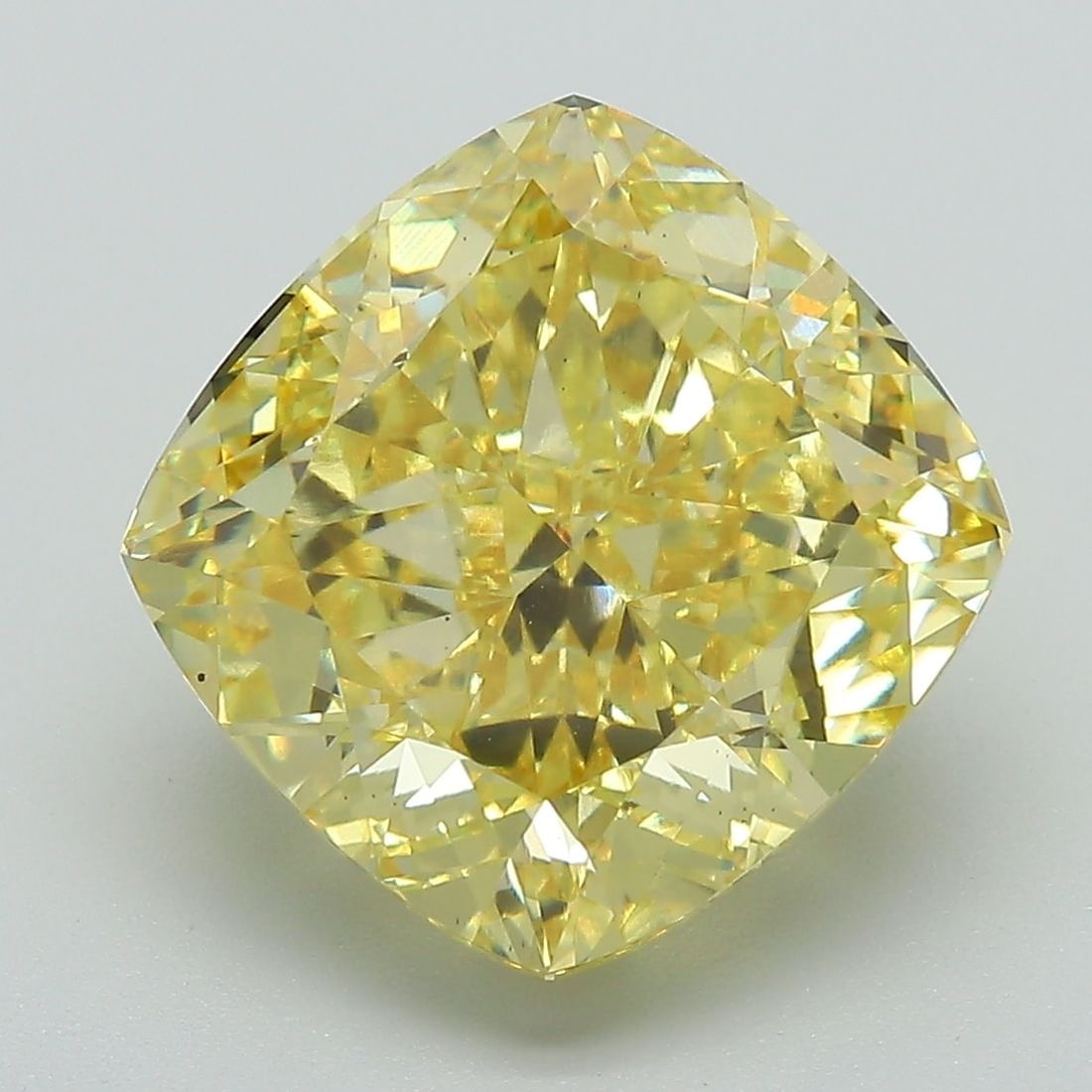 Loose Diamond - CUSHION BRILLIANT 7.37ct Fancy Vivid Yellow VS2: Loose Diamond - CUSHION BRILLIANT 7.37ct Fancy Vivid Yellow VS2 Source: This is a real non-mined Diamond that has been grown in a lab Shape: CUSHION BRILLIANT Carats: 7.37 Color: Fancy Vivid Yellow Ce