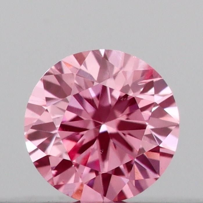 Loose Diamond - ROUND 0.1ct Fancy Vivid Pink SI1: Loose Diamond - ROUND 0.1ct Fancy Vivid Pink SI1 Source: This is a real non-mined Diamond that has been grown in a lab Shape: ROUND Carats: 0.1 Color: Fancy Vivid Pink Certification: IGI Video: