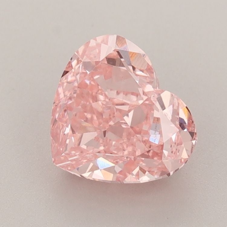 Loose Diamond - HEART 1.56ct Fancy Vivid Pink VS1: Loose Diamond - HEART 1.56ct Fancy Vivid Pink VS1 Source: This is a real non-mined Diamond that has been grown in a lab Shape: HEART Carats: 1.56 Color: Fancy Vivid Pink Certification: IGI Video: