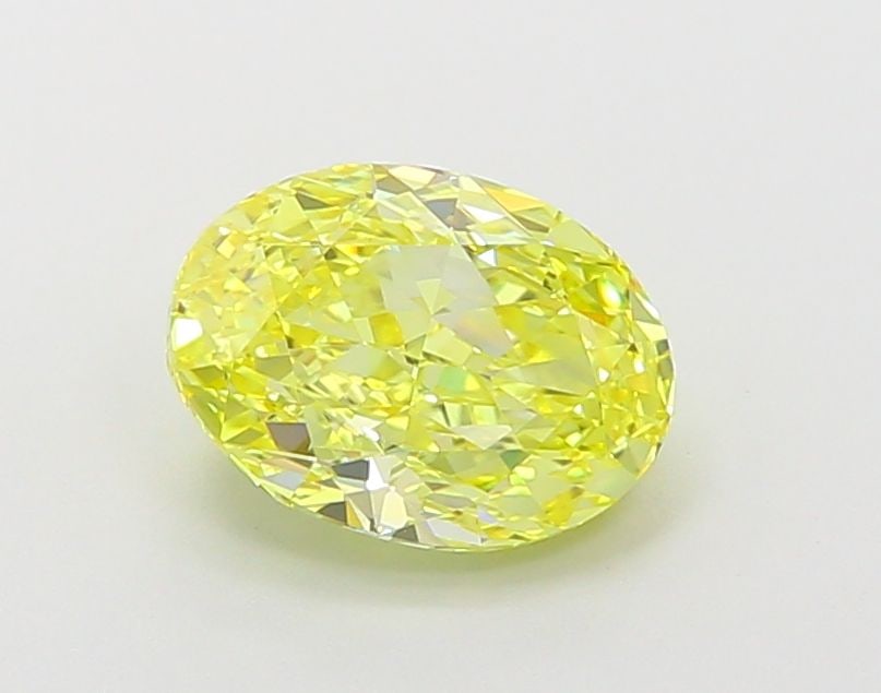 Loose Diamond - OVAL 2.01ct Fancy Vivid Yellow VVS2: Loose Diamond - OVAL 2.01ct Fancy Vivid Yellow VVS2 Source: This is a real non-mined Diamond that has been grown in a lab Shape: OVAL Carats: 2.01 Color: Fancy Vivid Yellow Certification: IGI Video: