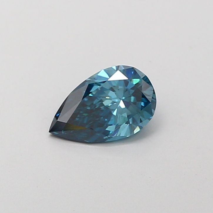Loose Diamond - PEAR 0.56ct Fancy Vivid Greenish Blue VS1: Loose Diamond - PEAR 0.56ct Fancy Vivid Greenish Blue VS1 Source: This is a real non-mined Diamond that has been grown in a lab Shape: PEAR Carats: 0.56 Color: Fancy Vivid Greenish Blue Certification: