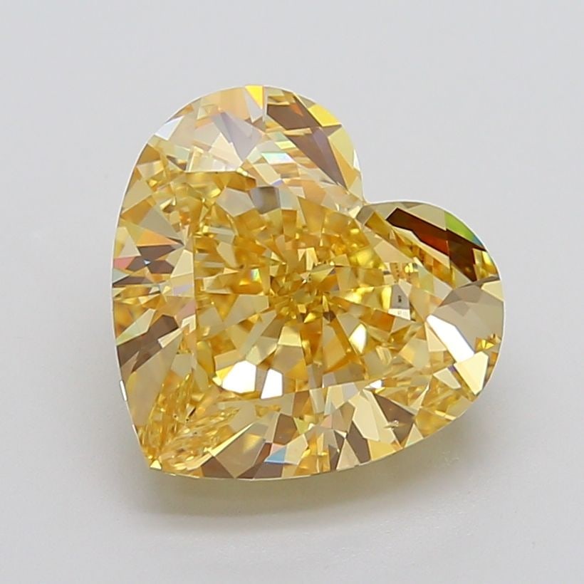 Loose Diamond - HEART 9.05ct Fancy Yellow VS2: Loose Diamond - HEART 9.05ct Fancy Yellow VS2 Source: This is a real non-mined Diamond that has been grown in a lab Shape: HEART Carats: 9.05 Color: Fancy Yellow Certification: IGI Video: