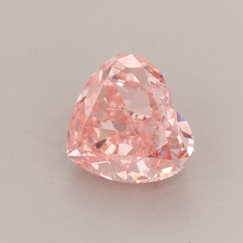 Loose Diamond - HEART 1.05ct Fancy Vivid Pink VVS2: Loose Diamond - HEART 1.05ct Fancy Vivid Pink VVS2 Source: This is a real non-mined Diamond that has been grown in a lab Shape: HEART Carats: 1.05 Color: Fancy Vivid Pink Certification: IGI Video: