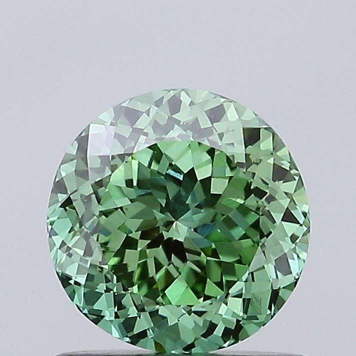 Loose Diamond - ROUND 0.94ct Fancy Vivid Green VS1: Loose Diamond - ROUND 0.94ct Fancy Vivid Green VS1 Source: This is a real non-mined Diamond that has been grown in a lab Shape: ROUND Carats: 0.94 Color: Fancy Vivid Green Certification: IGI Video: