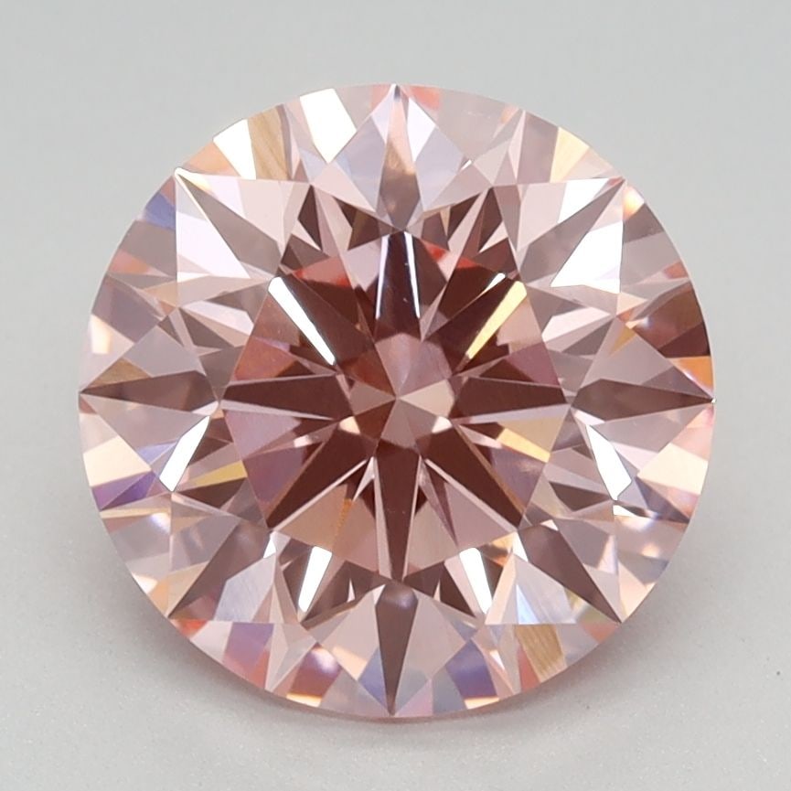 Ideal Loose Diamond - ROUND 2.27ct Fancy Vivid Pink VVS2: Ideal Loose Diamond - ROUND 2.27ct Fancy Vivid Pink VVS2 Source: This is a real non-mined Diamond that has been grown in a lab Shape: ROUND Carats: 2.27 Color: Fancy Vivid Pink Certification: IGI