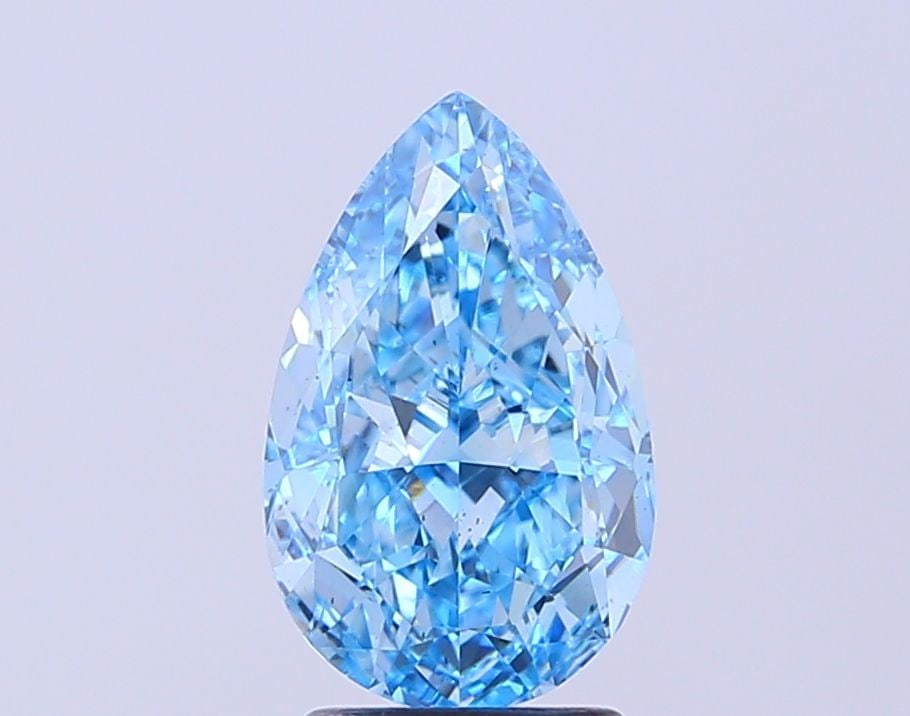 Loose Diamond - PEAR 2.6ct Fancy Vivid Blue VS2: Loose Diamond - PEAR 2.6ct Fancy Vivid Blue VS2 Source: This is a real non-mined Diamond that has been grown in a lab Shape: PEAR Carats: 2.6 Color: Fancy Vivid Blue Certification: IGI Video: