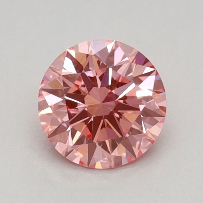 Ideal Loose Diamond - ROUND 0.56ct Fancy Vivid Pink VVS2: Ideal Loose Diamond - ROUND 0.56ct Fancy Vivid Pink VVS2 Source: This is a real non-mined Diamond that has been grown in a lab Shape: ROUND Carats: 0.56 Color: Fancy Vivid Pink Certification: IGI Vide