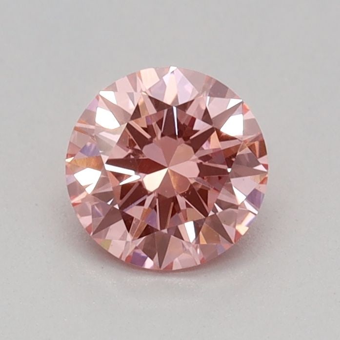Loose Diamond - ROUND 0.32ct Fancy Vivid Pink VS1: Loose Diamond - ROUND 0.32ct Fancy Vivid Pink VS1 Source: This is a real non-mined Diamond that has been grown in a lab Shape: ROUND Carats: 0.32 Color: Fancy Vivid Pink Certification: IGI Video: