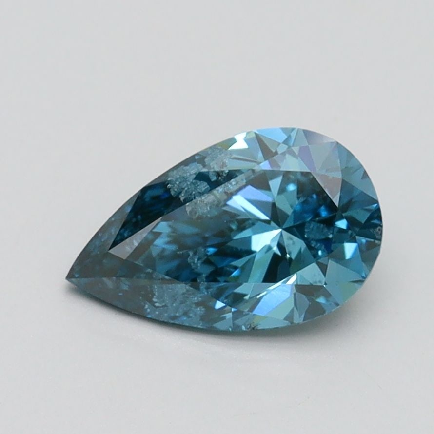 Loose Diamond - PEAR 1.0ct Fancy Vivid Blue SI2: Loose Diamond - PEAR 1.0ct Fancy Vivid Blue SI2 Source: This is a real non-mined Diamond that has been grown in a lab Shape: PEAR Carats: 1.0 Color: Fancy Vivid Blue Certification: IGI Video:
