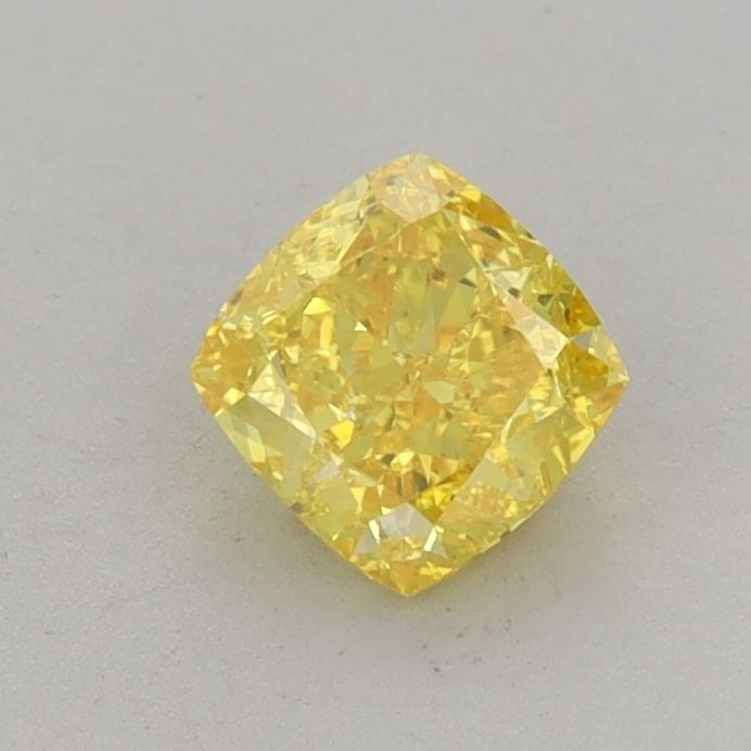 Loose Diamond - CUSHION BRILLIANT 0.62ct Fancy Vivid Yellow VVS2: Loose Diamond - CUSHION BRILLIANT 0.62ct Fancy Vivid Yellow VVS2 Source: This is a real non-mined Diamond that has been grown in a lab Shape: CUSHION BRILLIANT Carats: 0.62 Color: Fancy Vivid Yellow C