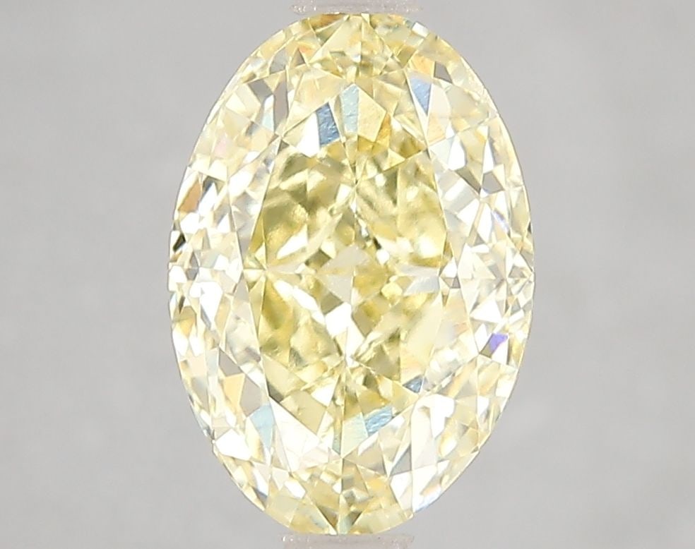 Loose Diamond - OVAL 3.02ct Fancy Vivid Yellow VS2: Loose Diamond - OVAL 3.02ct Fancy Vivid Yellow VS2 Source: This is a real non-mined Diamond that has been grown in a lab Shape: OVAL Carats: 3.02 Color: Fancy Vivid Yellow Certification: IGI Video: