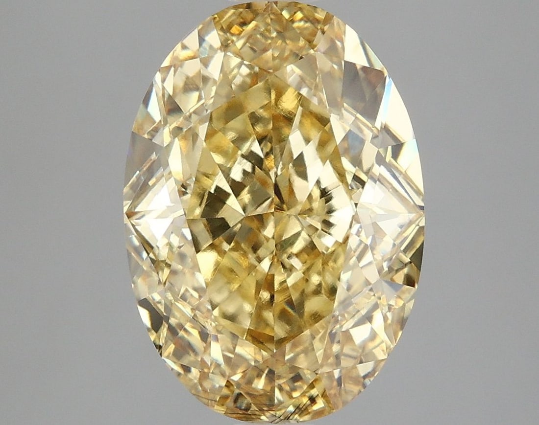 Loose Diamond - OVAL 4.06ct Fancy Vivid Yellow VS2: Loose Diamond - OVAL 4.06ct Fancy Vivid Yellow VS2 Source: This is a real non-mined Diamond that has been grown in a lab Shape: OVAL Carats: 4.06 Color: Fancy Vivid Yellow Certification: IGI Video: