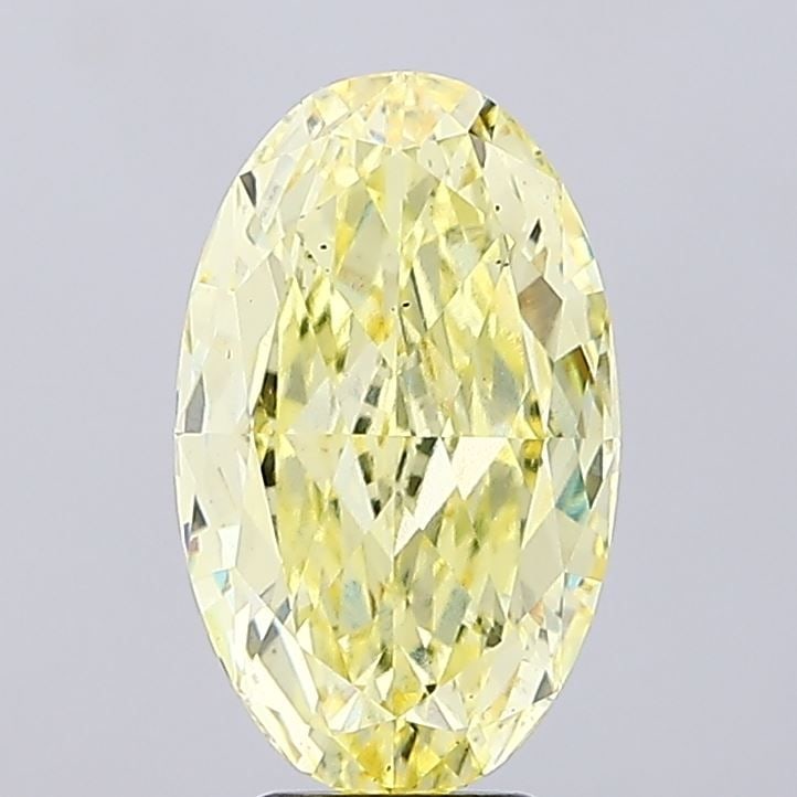 Loose Diamond - OVAL 5.86ct Fancy Intense Yellow VS2: Loose Diamond - OVAL 5.86ct Fancy Intense Yellow VS2 Source: This is a real non-mined Diamond that has been grown in a lab Shape: OVAL Carats: 5.86 Color: Fancy Intense Yellow Certification: IGI