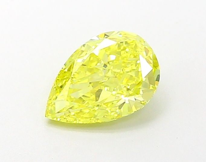 Loose Diamond - PEAR 1.0ct Fancy Vivid Yellow VS1: Loose Diamond - PEAR 1.0ct Fancy Vivid Yellow VS1 Source: This is a real non-mined Diamond that has been grown in a lab Shape: PEAR Carats: 1.0 Color: Fancy Vivid Yellow Certification: IGI Video: