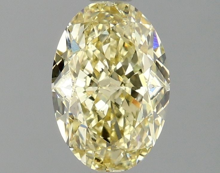 Loose Diamond - OVAL 1.59ct Fancy Intense Yellow VS1: Loose Diamond - OVAL 1.59ct Fancy Intense Yellow VS1 Source: This is a real non-mined Diamond that has been grown in a lab Shape: OVAL Carats: 1.59 Color: Fancy Intense Yellow Certification: IGI Video