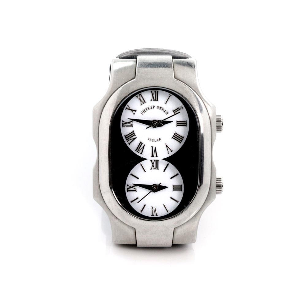 Philip Stein Teslar Dual Time Zone Stainless Steel Watch: Philip Stein Teslar Dual Time Zone Stainless Steel Watch This authentic Philip Stein wristwatch from the Teslar collection combines elegance and functionality. The watch features a robust stainless st