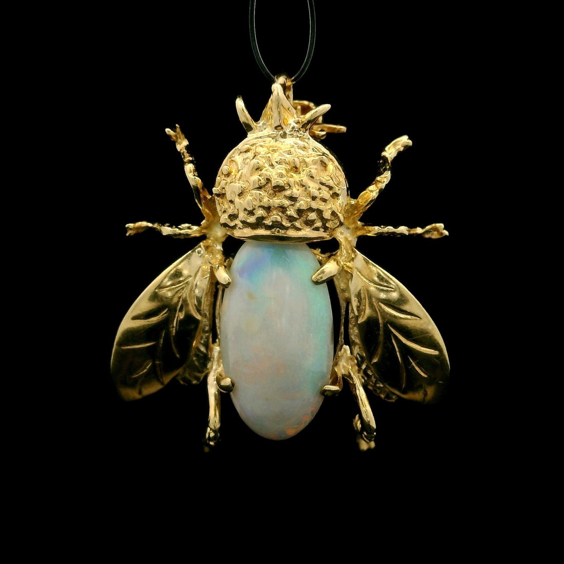 Estate 14k Yellow Gold Honeybee Opal Brooch Pendant: Estate 14k Yellow Gold Honeybee Opal Brooch Pendant This exquisite estate piece features a stunning honeybee pin brooch or pendant crafted from solid 14k yellow gold. The focal point of this detailed
