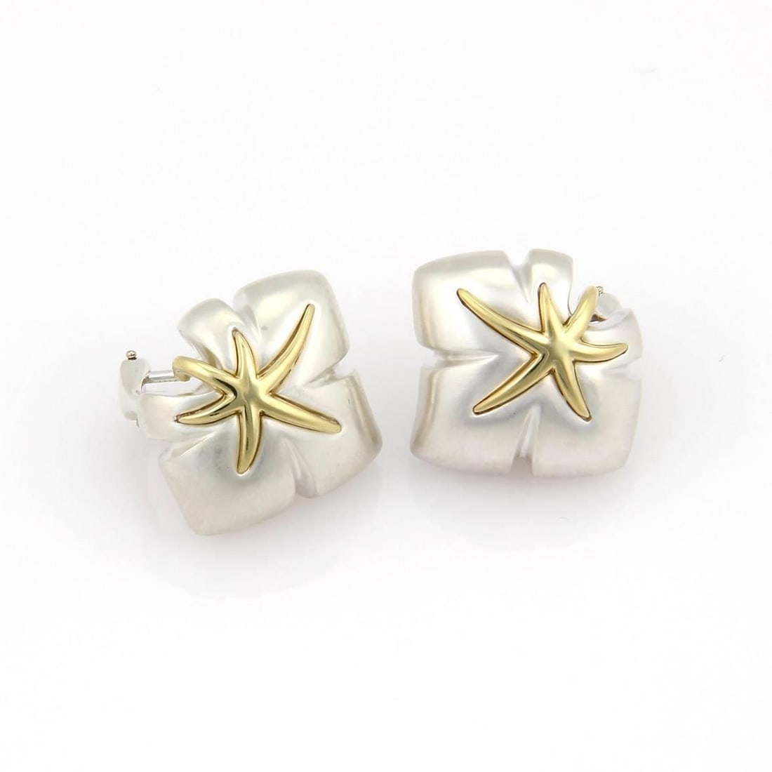 Tiffany & Co. Ivy Starfish Earrings 18k Gold Sterling Silver Clip-On: Tiffany & Co. Ivy Starfish Earrings 18k Gold Sterling Silver Clip-On Adorn your ears with these exquisite vintage earrings from Tiffany & Co.'s "Ivy Starfish" collection. Crafted from 925 Sterling sil
