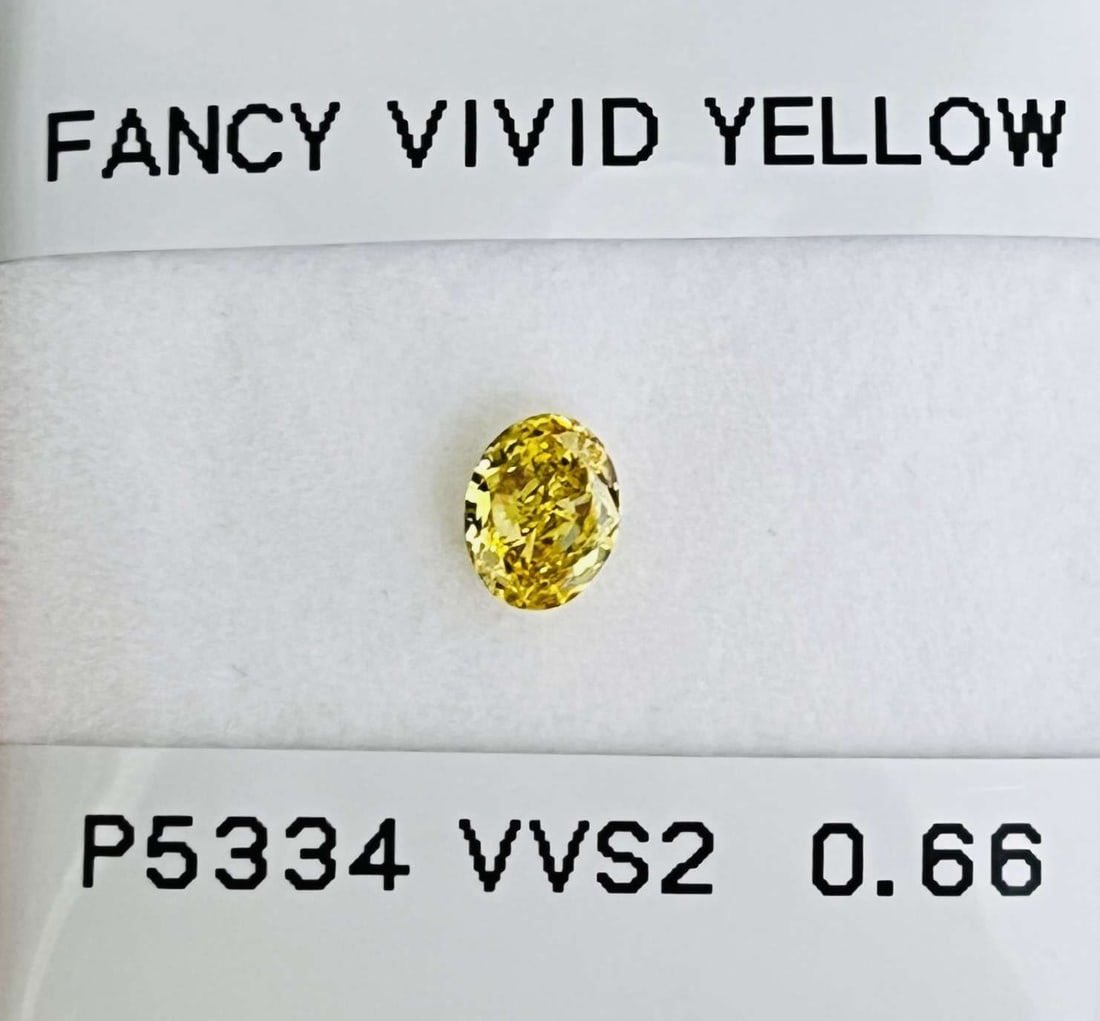 Loose Diamond - OVAL 0.66ct Fancy Vivid Yellow VVS2: Loose Diamond - OVAL 0.66ct Fancy Vivid Yellow VVS2 Source: Natural Shape: OVAL Carats: 0.66 Color: Fancy Vivid Yellow Certification: GIA Video: