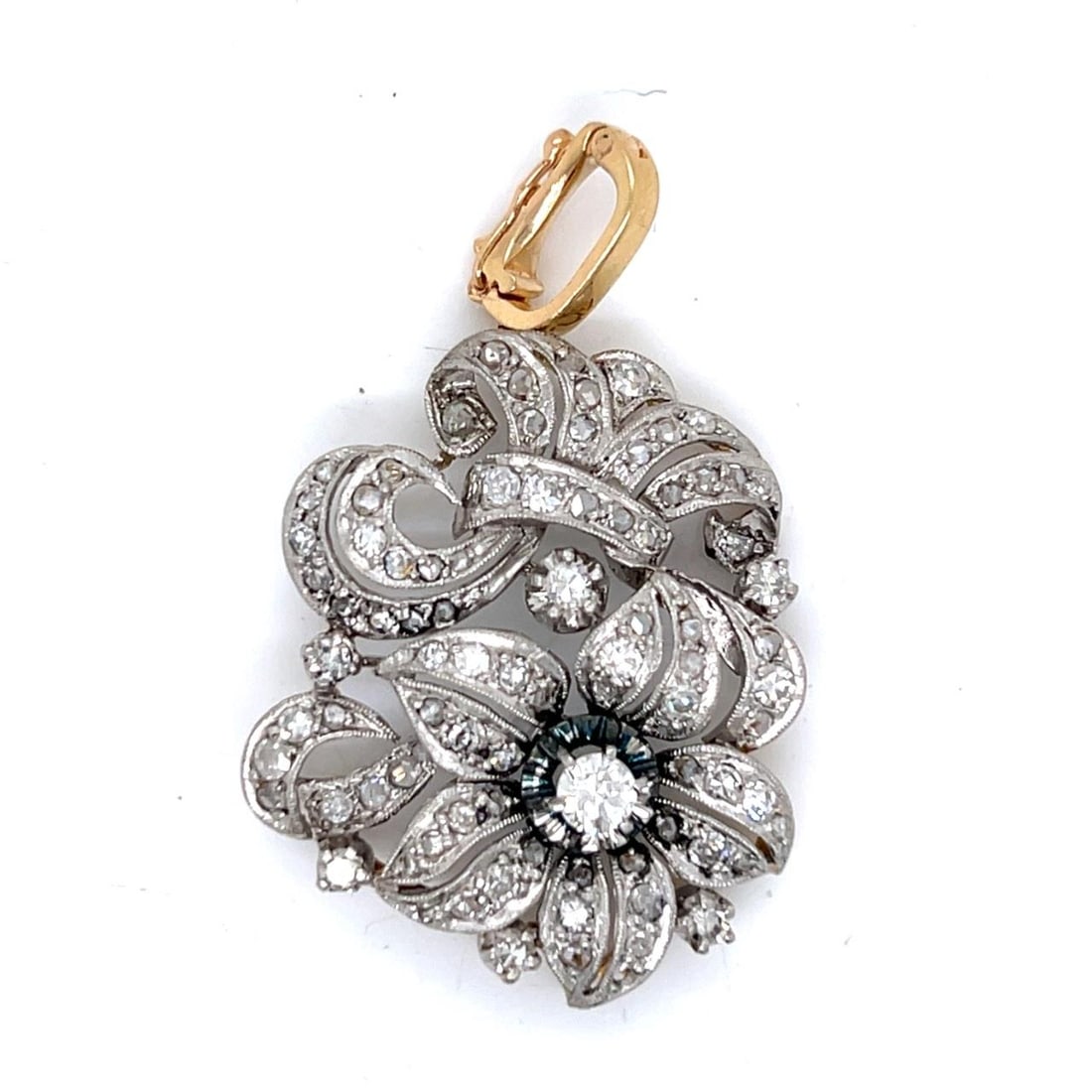 Diamond Pendant in Platinum and 14K Yellow Gold Antique 2 Inch 2.25 Carat: Diamond Pendant in Platinum and 14K Yellow Gold Antique 2 Inch 2.25 Carat This antique pendant features a combination of platinum and 14K yellow gold, set with approximately 2.25 carats of diamonds. T