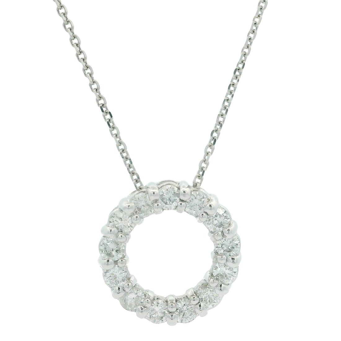 14k White Gold 0.80ctw Diamond Circle Of Life Pendant Necklace: 14k White Gold 0.80ctw Diamond Circle Of Life Pendant Necklace This exquisite 14k white gold pendant features a stunning open circle design, elegantly adorned with 13 round brilliant cut diamonds. The
