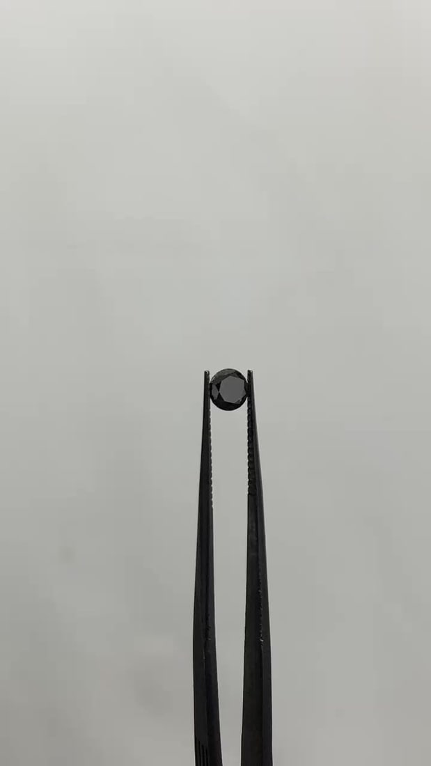 Loose Diamond - ROUND 0.57ct Fancy Black VVS2: Loose Diamond - ROUND 0.57ct Fancy Black VVS2 Source: Natural Shape: ROUND Carats: 0.57 Color: Fancy Black Certification: GIA Video: