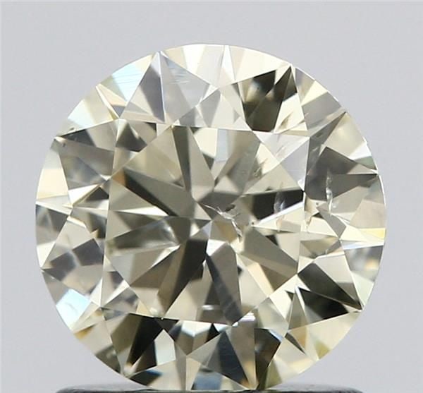 Loose Diamond - ROUND 1.01ct O-P SI2: Loose Diamond - ROUND 1.01ct O-P SI2 Source: Natural Shape: ROUND Carats: 1.01 Color: O-P Certification: GIA Video: