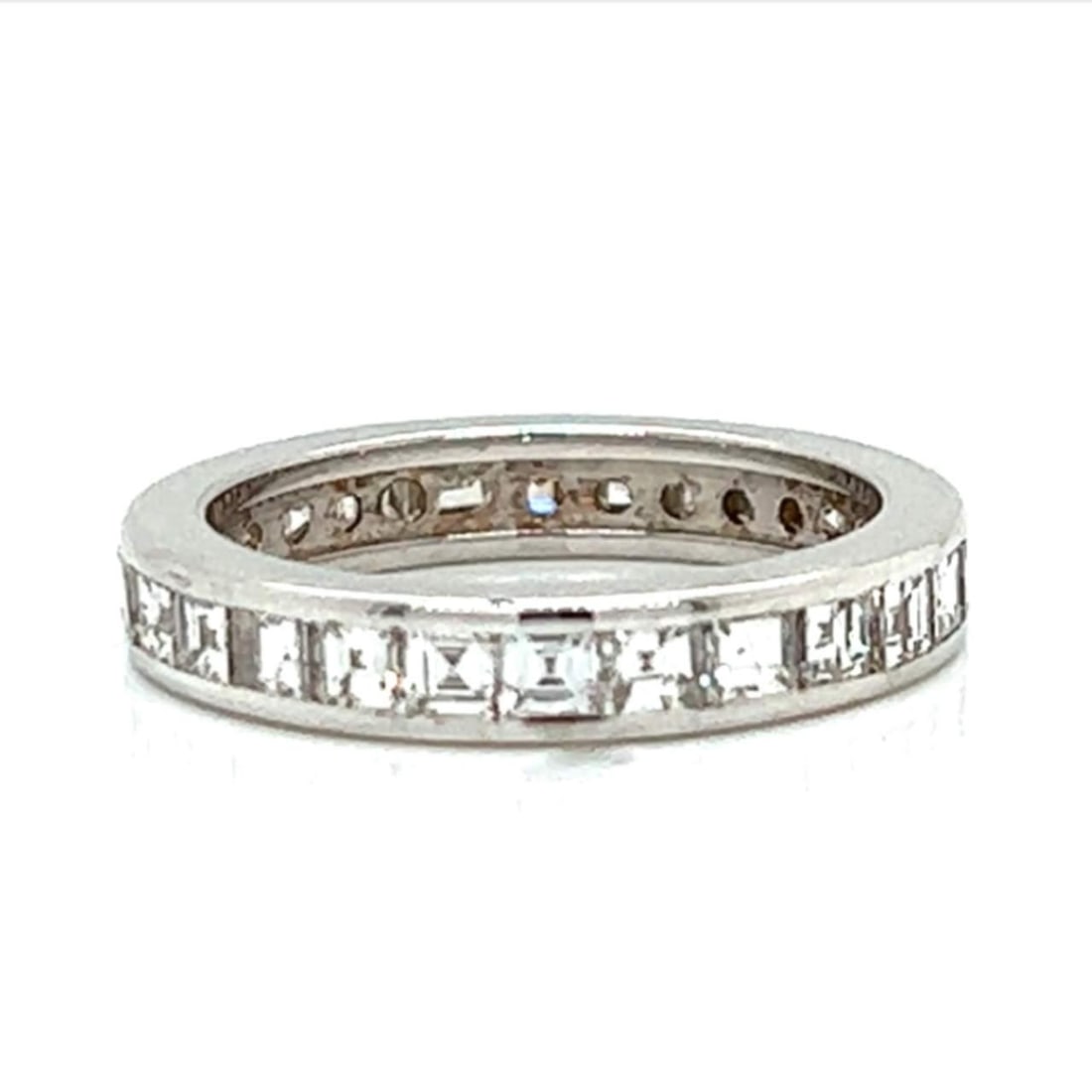 18K White Gold Asscher Cut 3.15 Ct Diamond Eternity Band: 18K White Gold Asscher Cut 3.15 Ct Diamond Eternity Band This stunning 18K White Gold Eternity Band features a total of 27 exquisite Asscher-cut diamonds, weighing approximately 3.15 carats. With a be