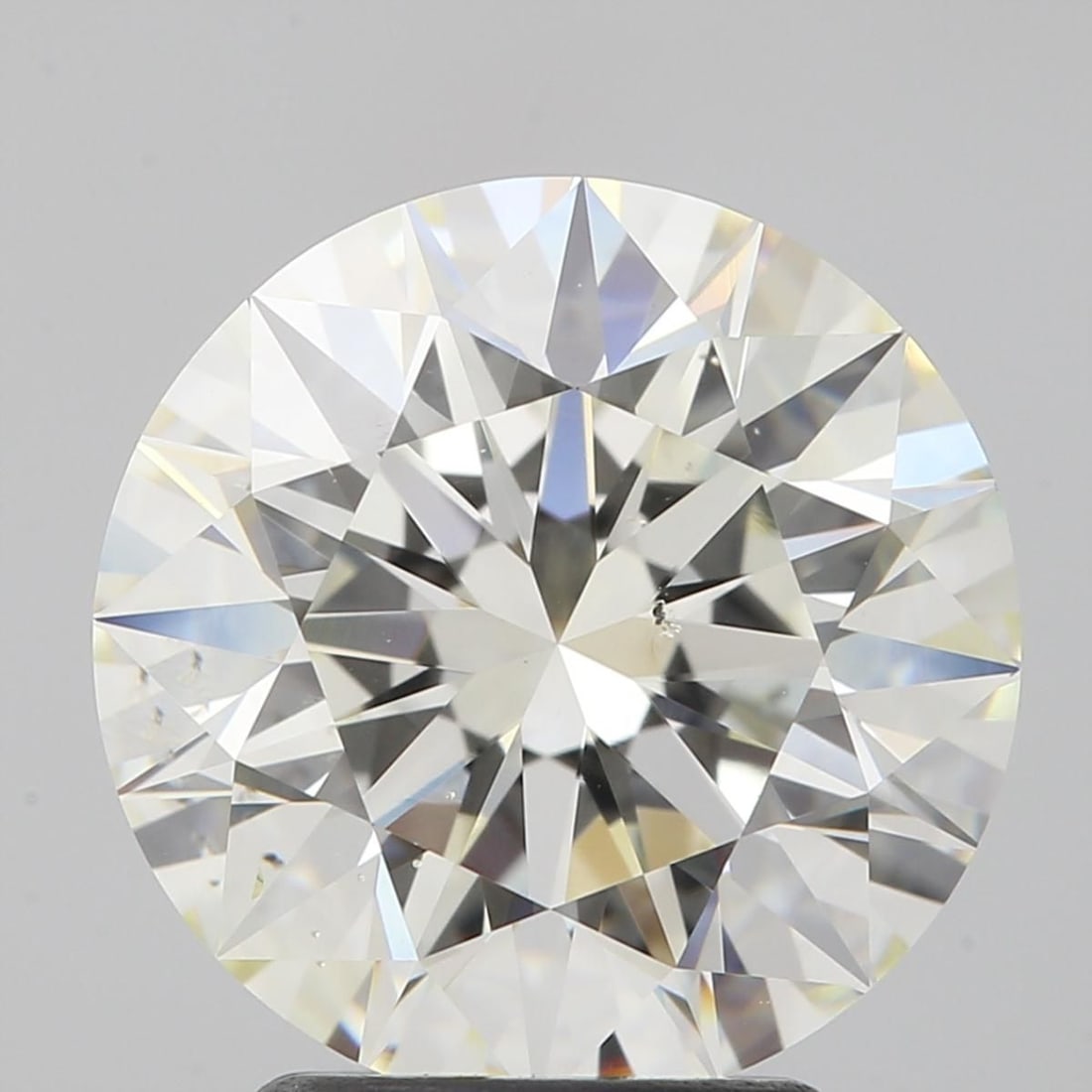 Loose Diamond - ROUND 3.1ct K SI1: Loose Diamond - ROUND 3.1ct K SI1 Source: Natural Shape: ROUND Carats: 3.1 Color: K Clarity: SI1 Certification: GIA Video: Video Link The Diamond Depot Guarantee: All items in this auction are