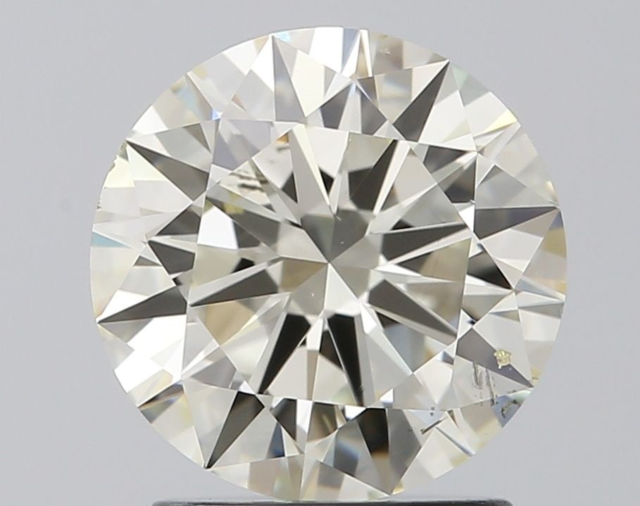 Loose Diamond - ROUND 1.73ct J SI1: Loose Diamond - ROUND 1.73ct J SI1 Source: Natural Shape: ROUND Carats: 1.73 Color: J Clarity: SI1 Certification: IGI Video: Video Link The Diamond Depot Guarantee: All items in this auction are