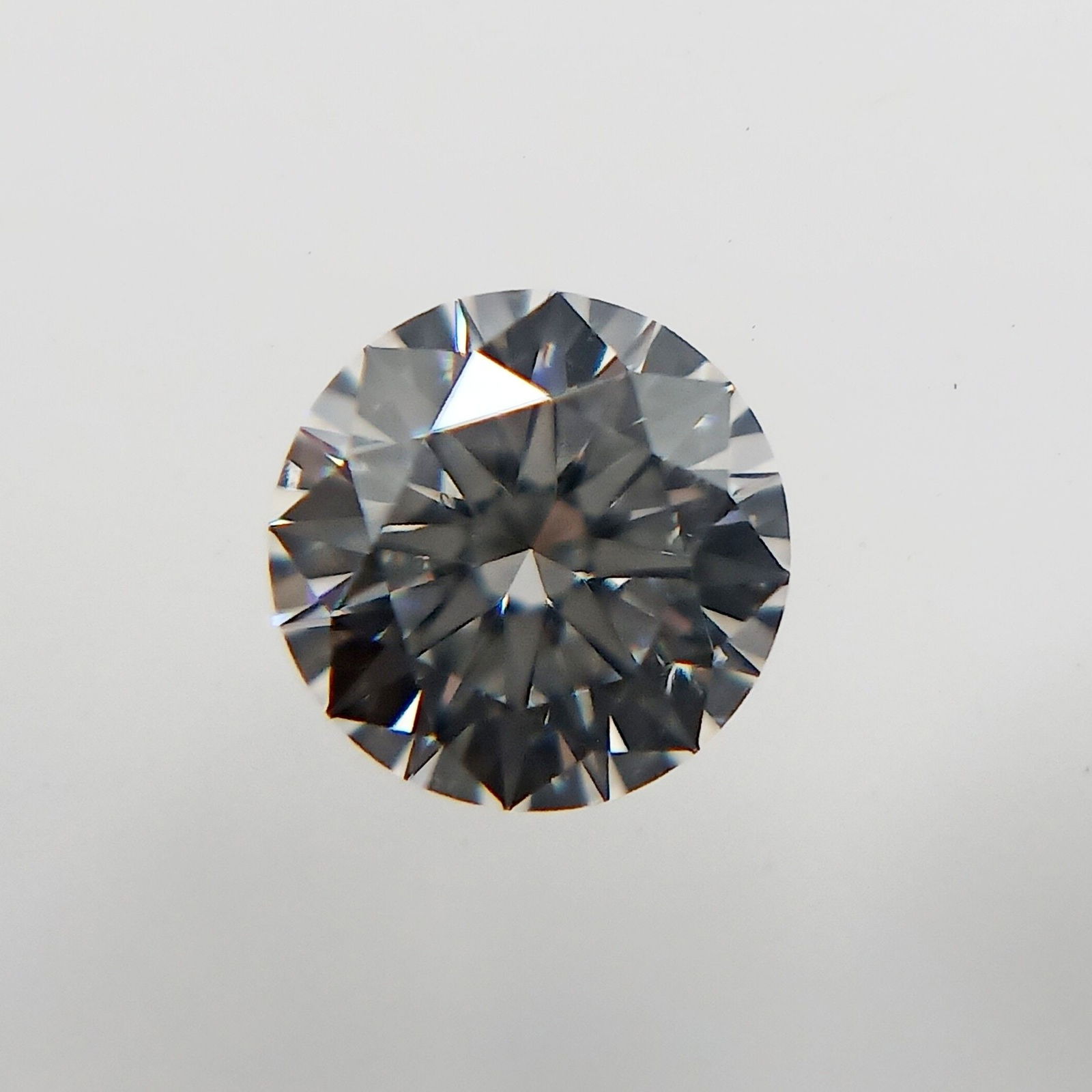Loose Diamond - ROUND 0.23ct E VVS2: Loose Diamond - ROUND 0.23ct E VVS2 Source: Natural Shape: ROUND Carats: 0.23 Color: E Clarity: VVS2 Certification: GIA The Diamond Depot Guarantee: All items in this auction are guaranteed to be 100%