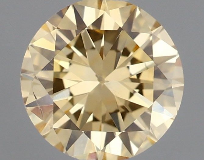 Loose Diamond - ROUND 0.62ct Fancy Orangey Yellow: Loose Diamond - ROUND 0.62ct Fancy Orangey Yellow Source: Natural Shape: ROUND Carats: 0.62 Color: Fancy Orangey Yellow Certification: GIA Video:
