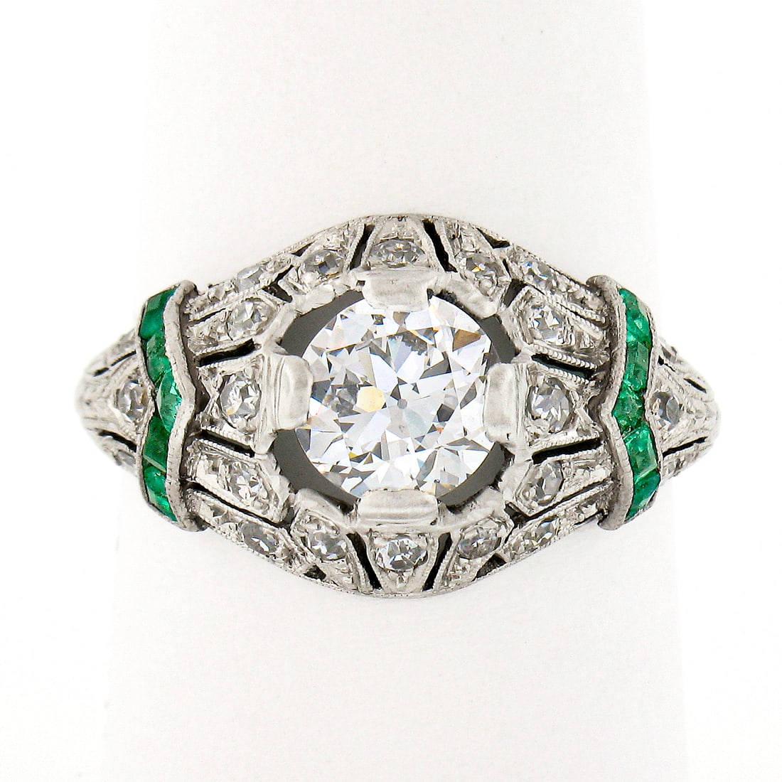 Antique Art Deco Platinum 1.53ct GIA Diamond & Emerald Engagement Ring: Antique Art Deco Platinum 1.53ct GIA Diamond & Emerald Engagement Ring This exquisite Antique Art Deco Platinum Ring showcases a stunning blend of craftsmanship and elegance. Featuring a magnificent 1