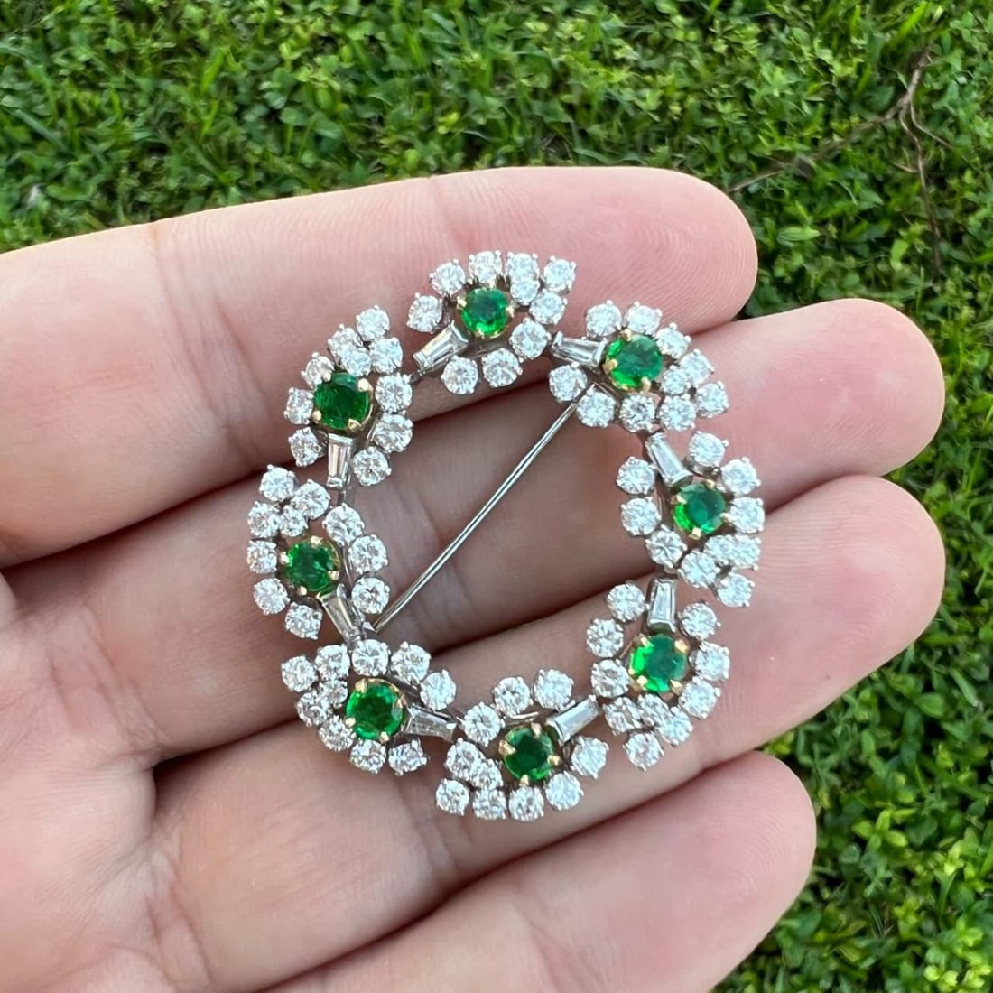 Platinum Emerald Diamond Brooch 16g 80 Diamonds 5.40 Ct 8 Emeralds: Platinum Emerald Diamond Brooch 16g 80 Diamonds 5.40 Ct 8 Emeralds This exquisite Platinum Emerald & Diamond Brooch features a stunning design, weighing 16.0 grams. It is adorned with 80 diamonds,