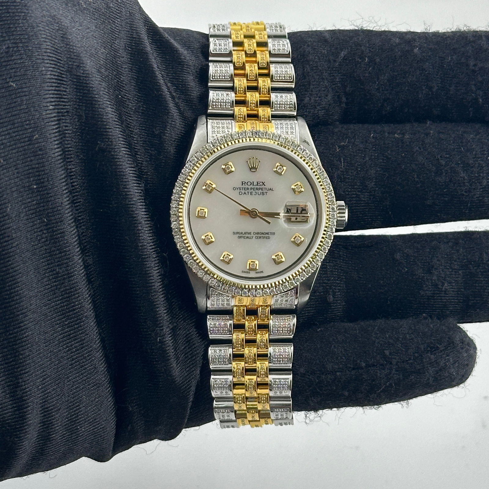 Aftermarket White MOP Diamond Dial Rolex Datejust 1603 Jubilee Bracelet: Aftermarket White MOP Diamond Dial Rolex Datejust 1603 Jubilee Bracelet This men's Rolex Datejust features an aftermarket white mother of pearl diamond dial, complemented by an aftermarket Jubilee bra