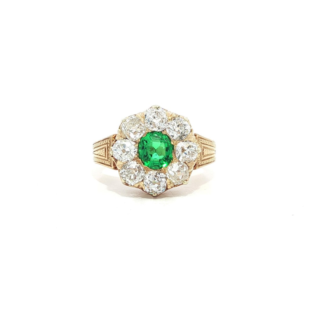 Rare Antique Tiffany & Co. 18k Yellow Gold Emerald Diamond Halo Ring: Rare Antique Tiffany & Co. 18k Yellow Gold Emerald Diamond Halo Ring This exquisite cocktail ring showcases a stunning natural emerald at its center, beautifully complemented by a halo of chunky old m