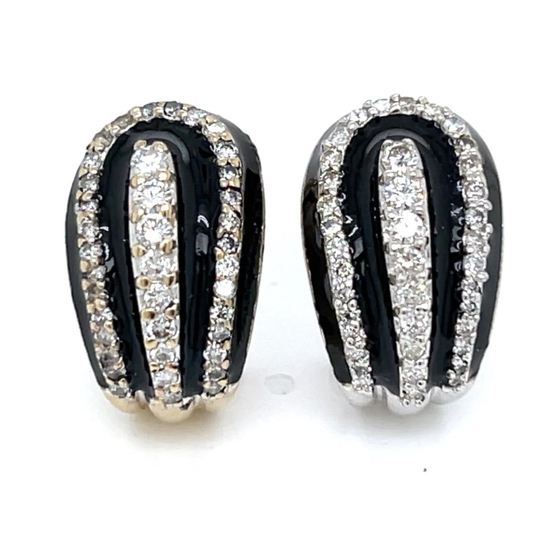 Huggie Earrings in 18K White Gold with 78 Diamonds 1.70 Carats: Huggie Earrings in 18K White Gold with 78 Diamonds 1.70 Carats These huggie earrings are crafted from 18K white gold and are set with a total of 78 diamonds weighing approximately 1.70 carats. The dia