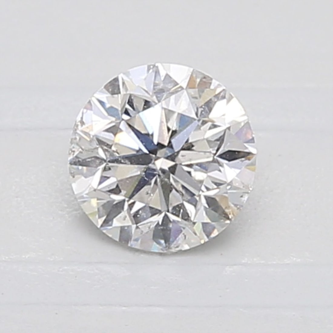 Loose Diamond - ROUND 0.71ct E I1: Loose Diamond - ROUND 0.71ct E I1 Source: Natural Shape: ROUND Carats: 0.71 Color: E Clarity: I1 Certification: GIA Video: