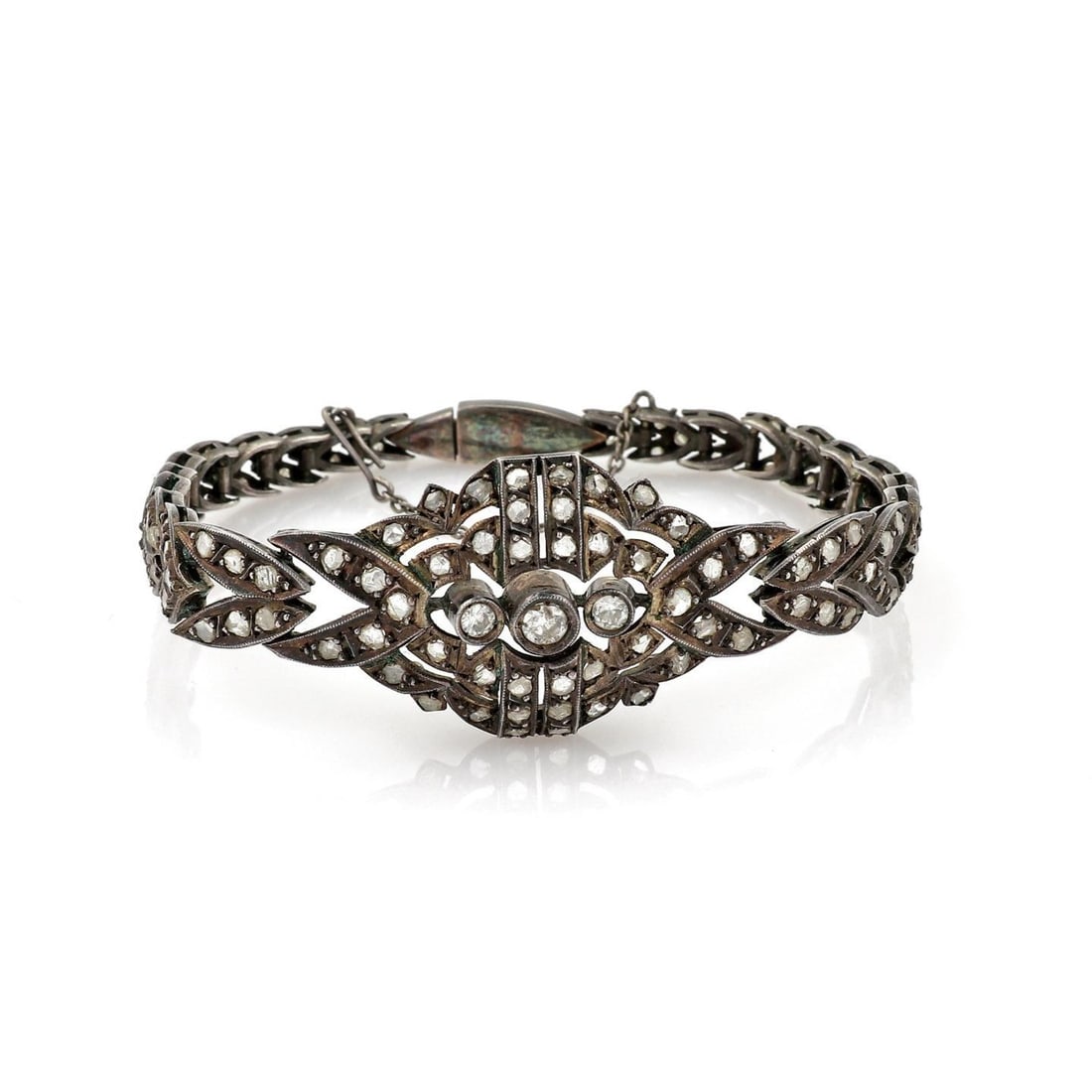 Antique Victorian Dark Silver Bracelet with 3.00ct Diamond Accents: Antique Victorian Dark Silver Bracelet with 3.00ct Diamond Accents Discover this exquisite Antique Victorian silver bracelet, showcasing a stunning dark antique finish. The piece features an open desi