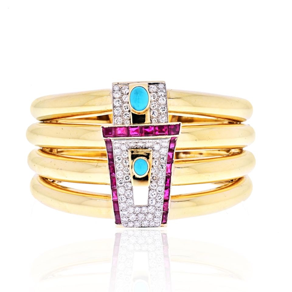 David Webb 1960s Platinum 18K Gold Diamond Ruby Turquoise Bangle: David Webb 1960s Platinum 18K Gold Diamond Ruby Turquoise Bangle This stunning bangle bracelet from David Webb showcases a beautiful combination of platinum and 18K yellow gold. The bracelet features