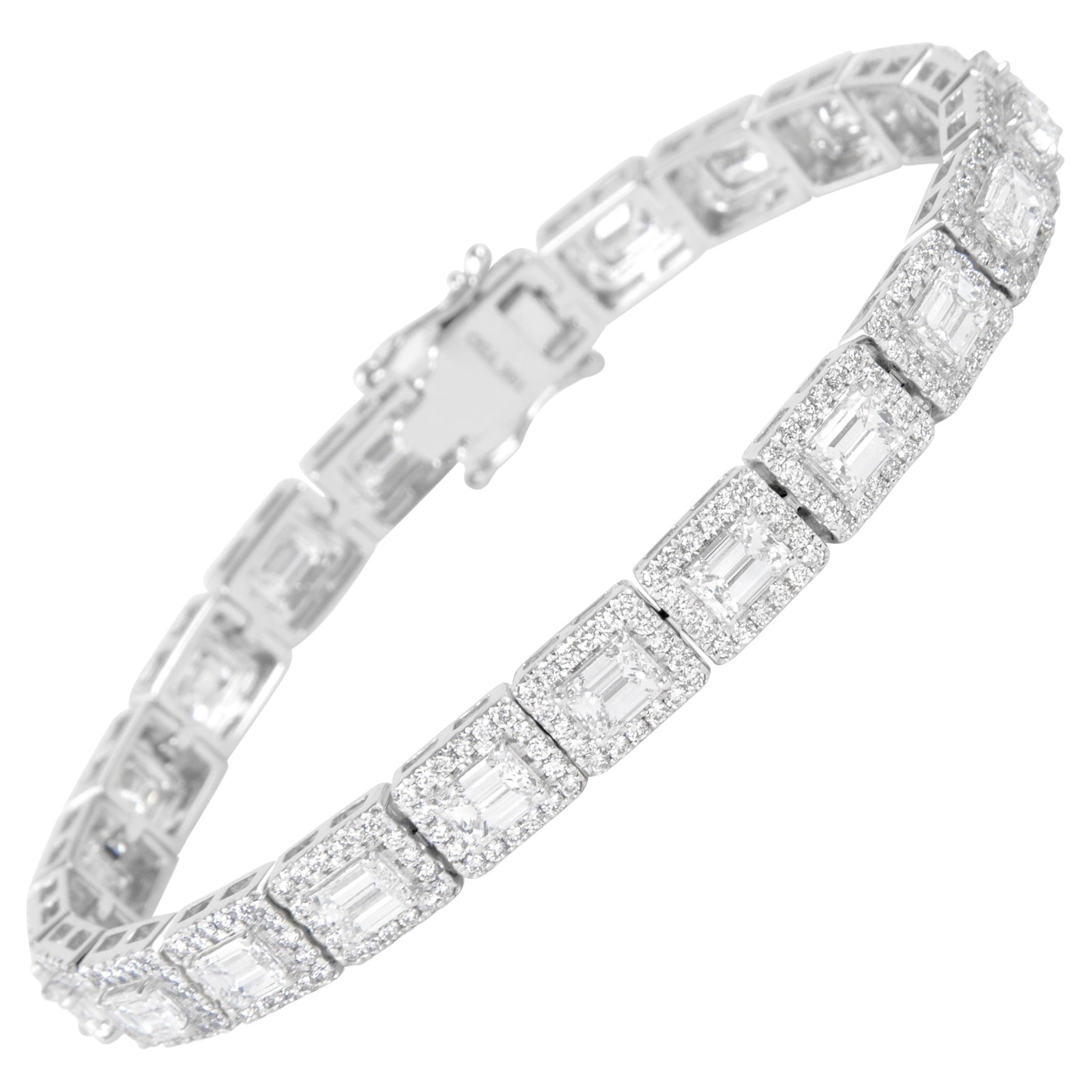 9.49ct Emerald Cut Diamond Tennis Bracelet 18k White Gold: 9.49ct Emerald Cut Diamond Tennis Bracelet 18k White Gold This exquisite emerald cut diamond tennis bracelet features a stunning total weight of 9.49 carats, crafted in luxurious 18k white gold. Desig