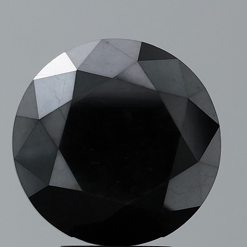 Loose Diamond - ROUND 0.29ct Black VS1: Loose Diamond - ROUND 0.29ct Black VS1 Source: Natural Shape: ROUND Carats: 0.29 Color: Black Certification: NONE Video: Video Link The Diamond Depot Guarantee: All items in this auction are