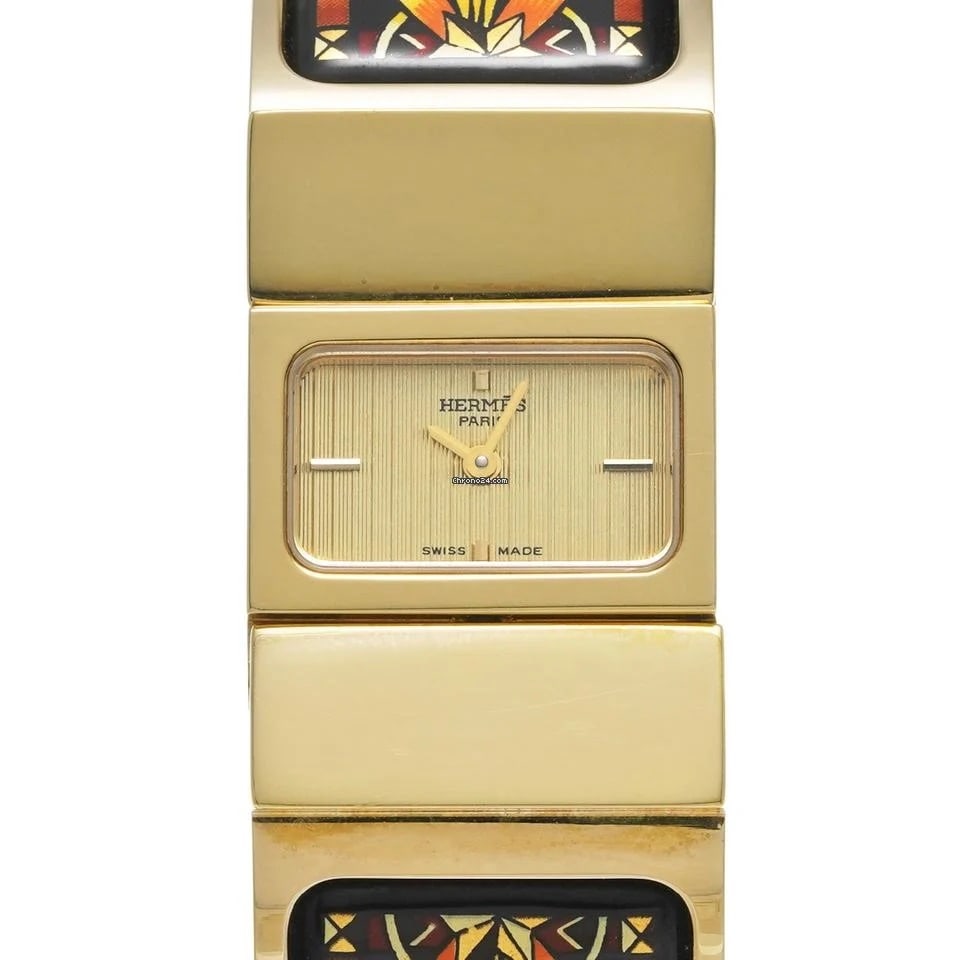 Ladies Hermes LO1.201 Watch with Gold Dial and Band: Ladies Hermes LO1.201 Watch with Gold Dial and Band Hermes ladies watch featuring a gold dial and band, identified by reference number LO1.201. The watch does not have a bezel and is part of the OG ca