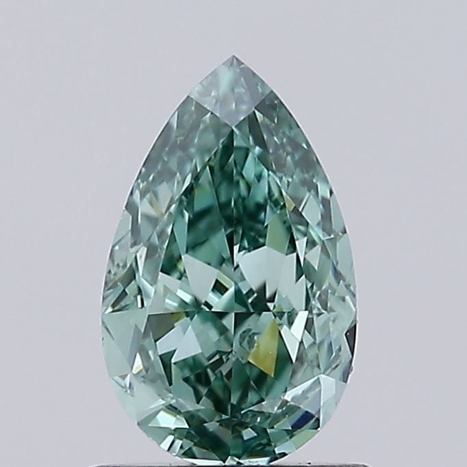 Loose Diamond - PEAR 0.91ct Fancy Vivid Green VS2: Loose Diamond - PEAR 0.91ct Fancy Vivid Green VS2 Source: This is a real non-mined Diamond that has been grown in a lab Shape: PEAR Carats: 0.91 Color: Fancy Vivid Green Certification: IGI Video: