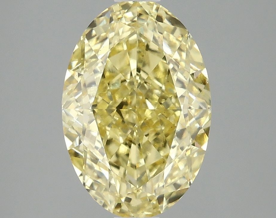 Loose Diamond - OVAL 3.07ct Fancy Vivid Yellow VS2: Loose Diamond - OVAL 3.07ct Fancy Vivid Yellow VS2 Source: This is a real non-mined Diamond that has been grown in a lab Shape: OVAL Carats: 3.07 Color: Fancy Vivid Yellow Certification: IGI Video: