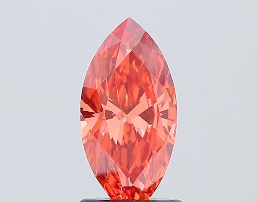 Loose Diamond - MARQUISE 1.04ct Fancy Vivid Orange Pink VS1: Loose Diamond - MARQUISE 1.04ct Fancy Vivid Orange Pink VS1 Source: This is a real non-mined Diamond that has been grown in a lab Shape: MARQUISE Carats: 1.04 Color: Fancy Vivid Orange Pink Certificat